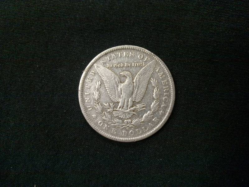 lot 32 image: 1890 O Morgan Silver Dollar...