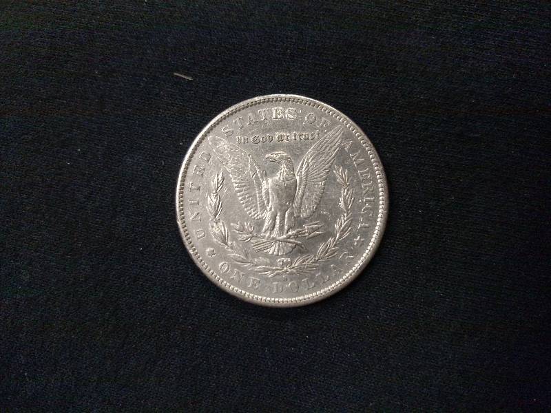 lot 33 image: 1890 S Morgan Silver Dollar...