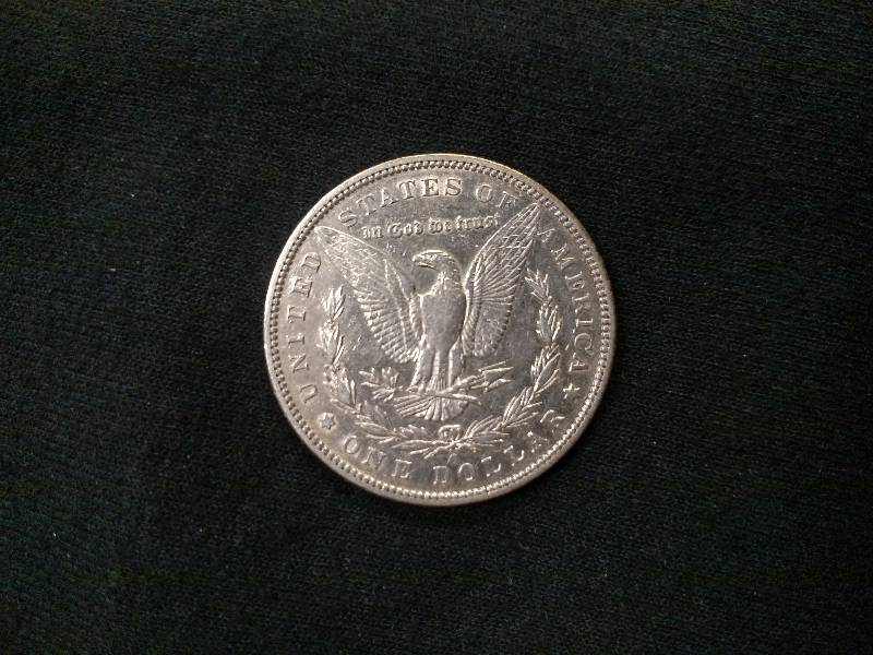 lot 44 image: 1896 O Morgan Silver Dollar...