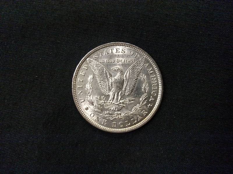lot 45 image: 1897 Morgan Silver Dollar...