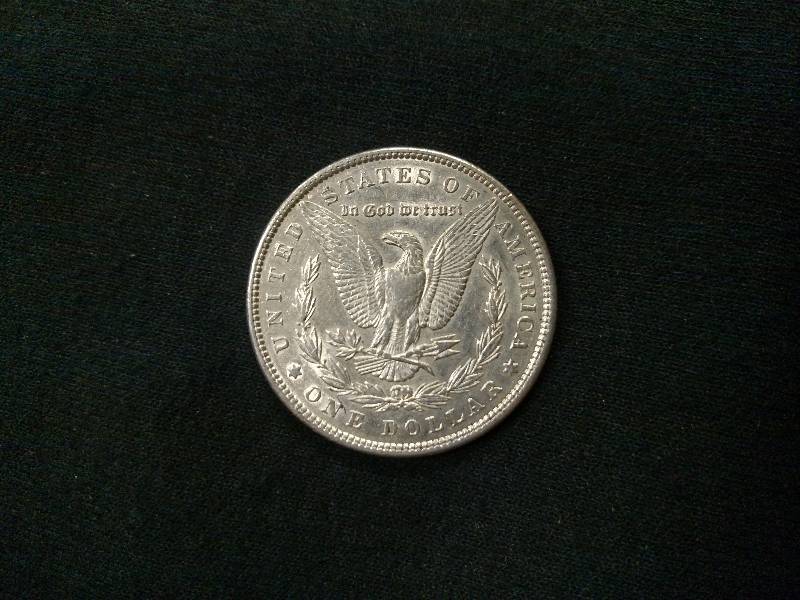 lot 46 image: 1897 Morgan Silver Dollar...