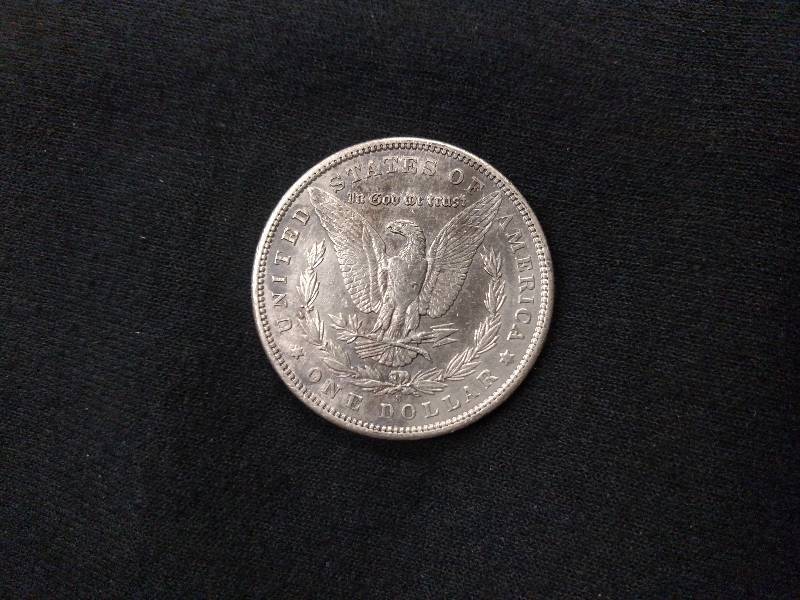 lot 48 image: 1897 S Morgan Silver Dollar...