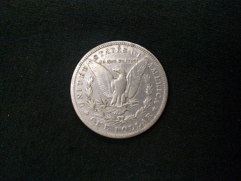 lot 51 image: 1899 O Morgan Silver Dollar...