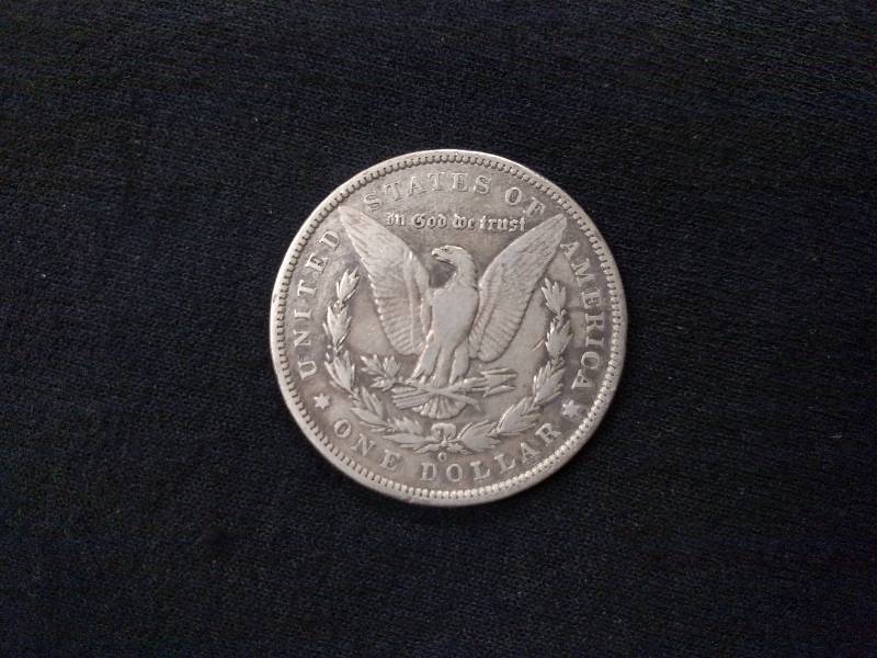 lot 52 image: 1899 O Morgan Silver Dollar...
