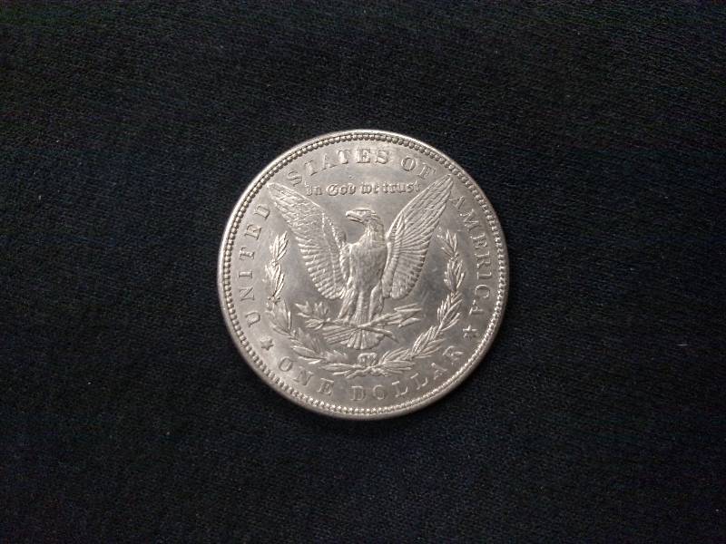 lot 54 image: 1900 Morgan Silver Dollar...