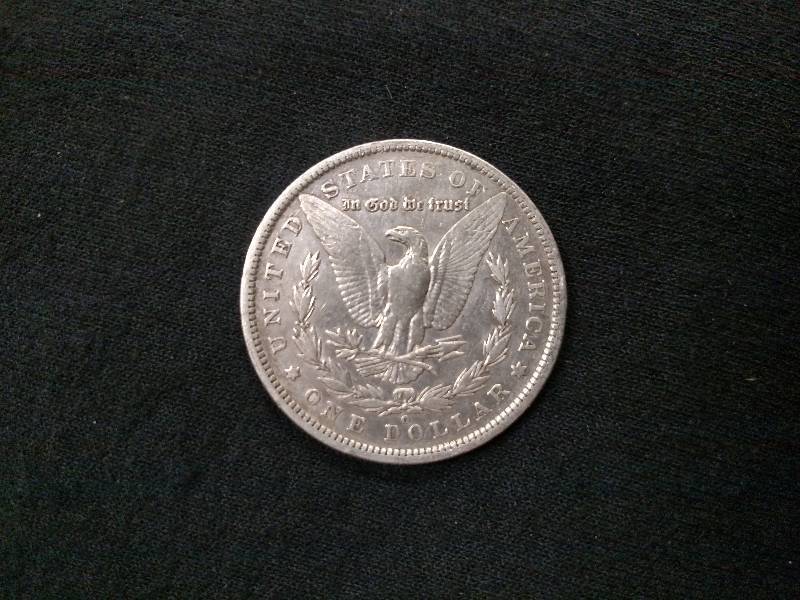 lot 55 image: 1900 O Morgan Silver Dollar...