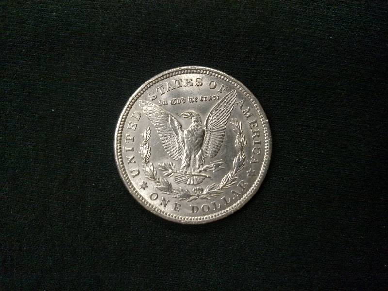lot 61 image: 1921 Morgan Silver Dollar...