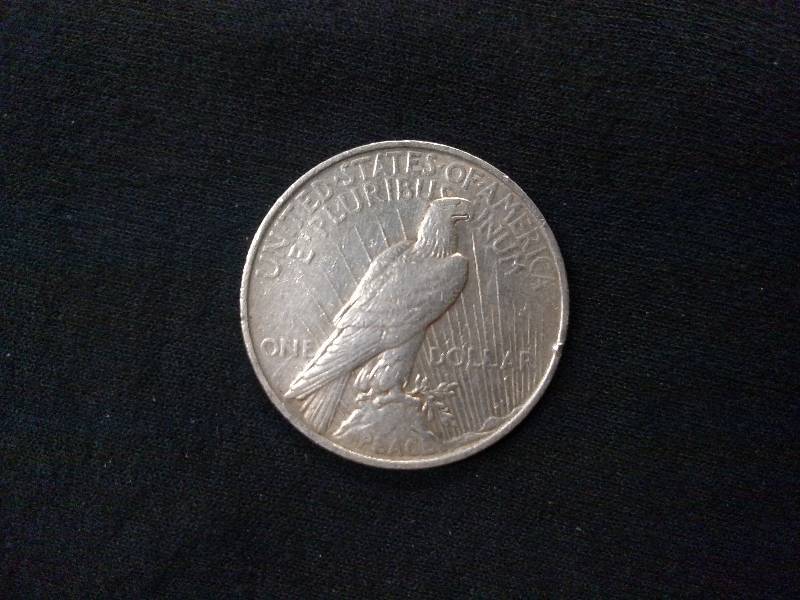 lot 76 image: 1922 Peace Silver Dollar...