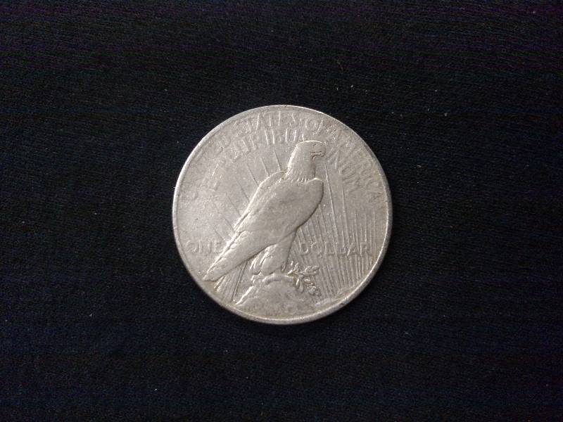 lot 79 image: 1922 Peace Silver Dollar...