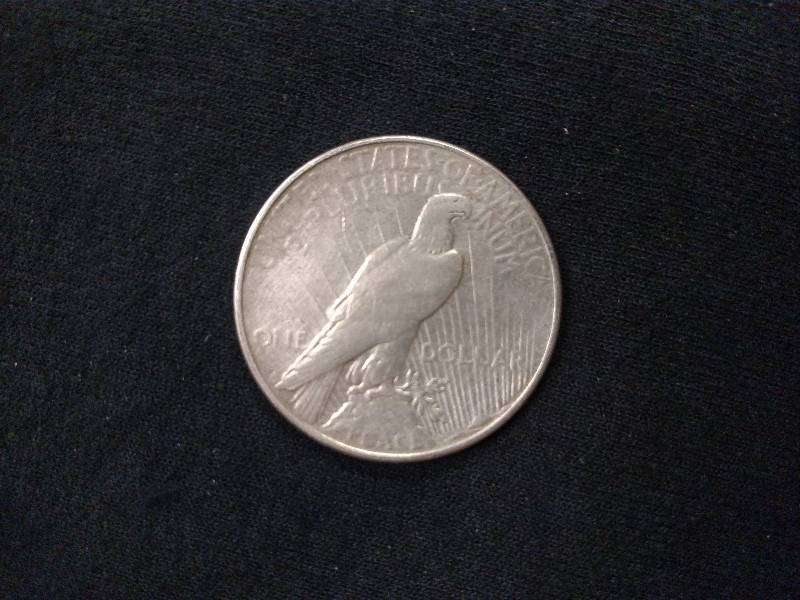 lot 82 image: 1922 D Peace Silver Dollar...