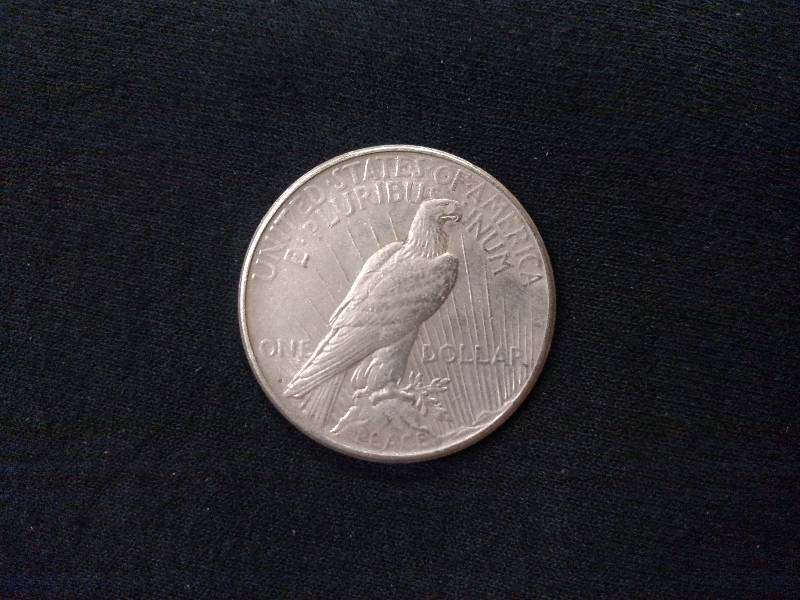 lot 86 image: 1922 S Peace Silver Dollar...