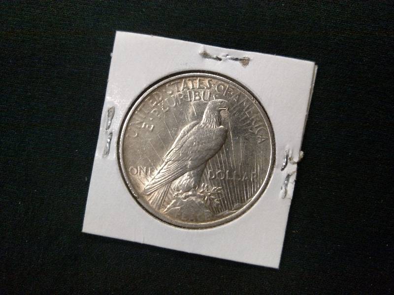 lot 99 image: 1924 Peace Silver Dollar...