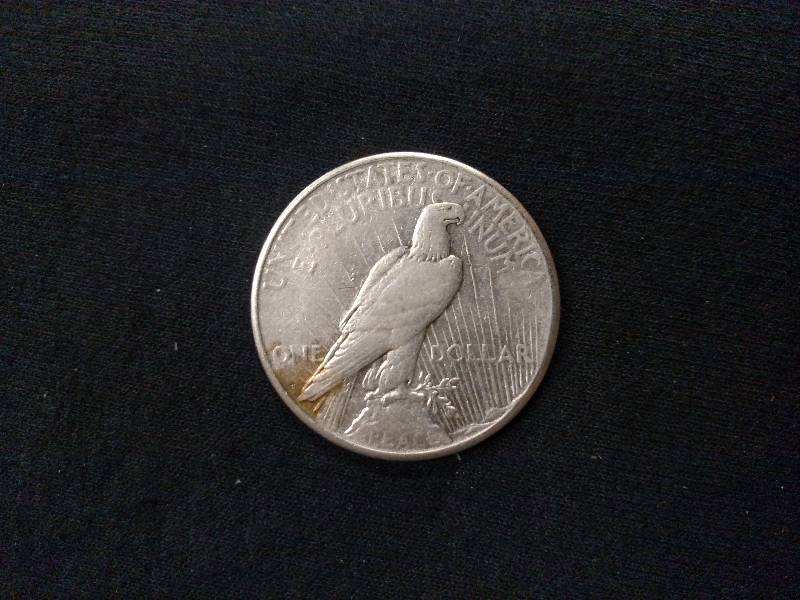 lot 100 image: 1924 S Peace Silver Dollar...