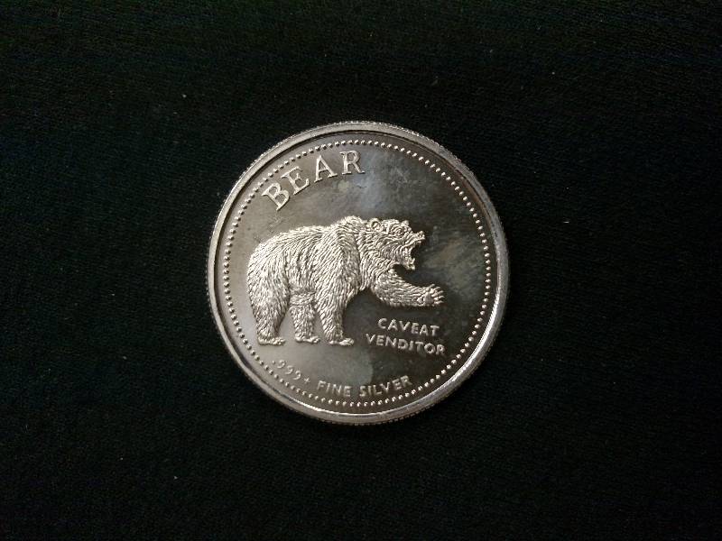 lot 120 image: BullBear One Ounce .999 Silver Coi...