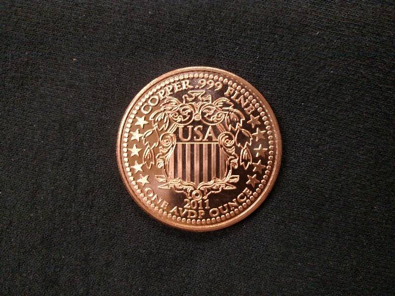 lot 128 image: Eagle One Ounce .999 Copper Coin...