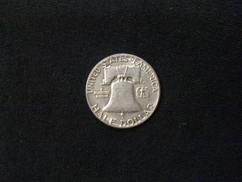 lot 135 image: 1951 Franklin Silver Half Dollar...