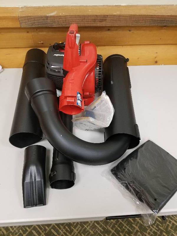 lot 23 image: Homelite 150 MPH 400 CFM 26cc Gas Handheld Blower Vacuum