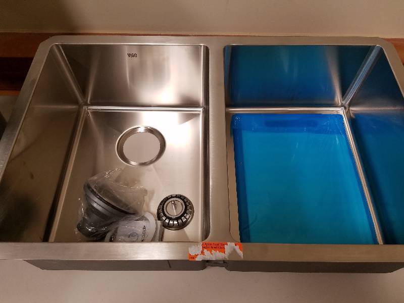 lot 64 image: VIGO Farmhouse Apron Front Stainless Steel 33 in. Double Bowl Kitchen Sink