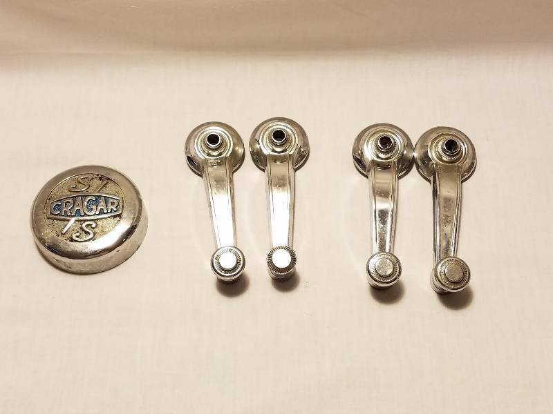 lot 188 image: 1967-69 DODGE WINDOW CRANK AND CRAGAR CENTER CAP
