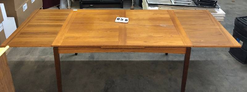 lot 58 image: Large Solid Wood Table with Built-In Leaves