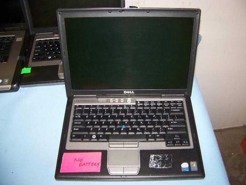 (4) Dell Laptop Computers  PCs, (3) Dell Docking Stations and (1) Dell Power Supply