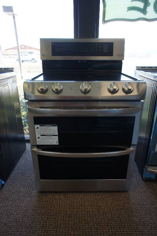 lot 12 image: NEW - SCRATCH AND DENT - LG MODEL # (LDE4411ST) - Electric Double Range - Freestanding - 7.3 cu ft - Stainless Steel - TESTED WORKS - MSRP $ 1399.99