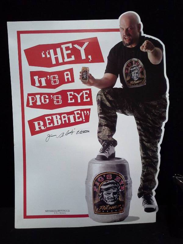 lot 9 image: Jesse Ventura, Pigs Eye beer, cardboard easel back