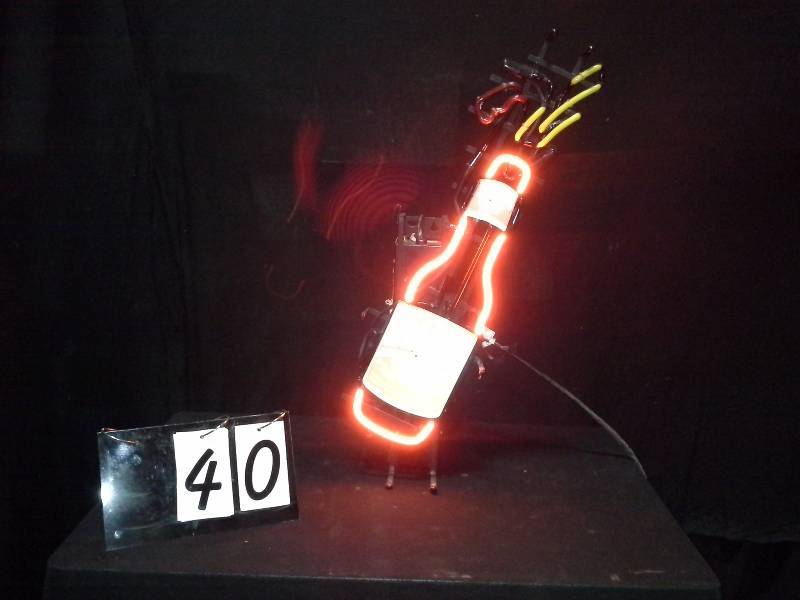 lot 40 image: Miller Sharps neon bottle