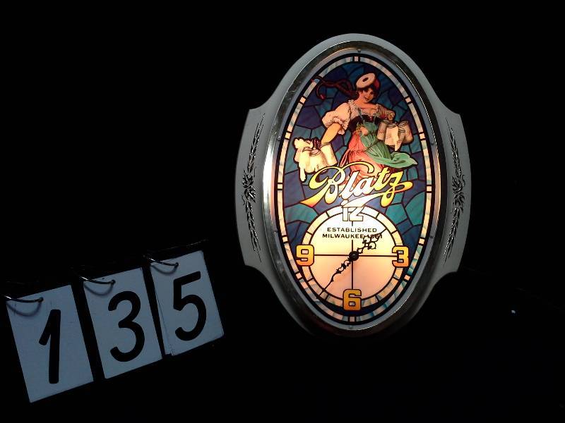 lot 135 image: Blatz girl faux stained glass clock