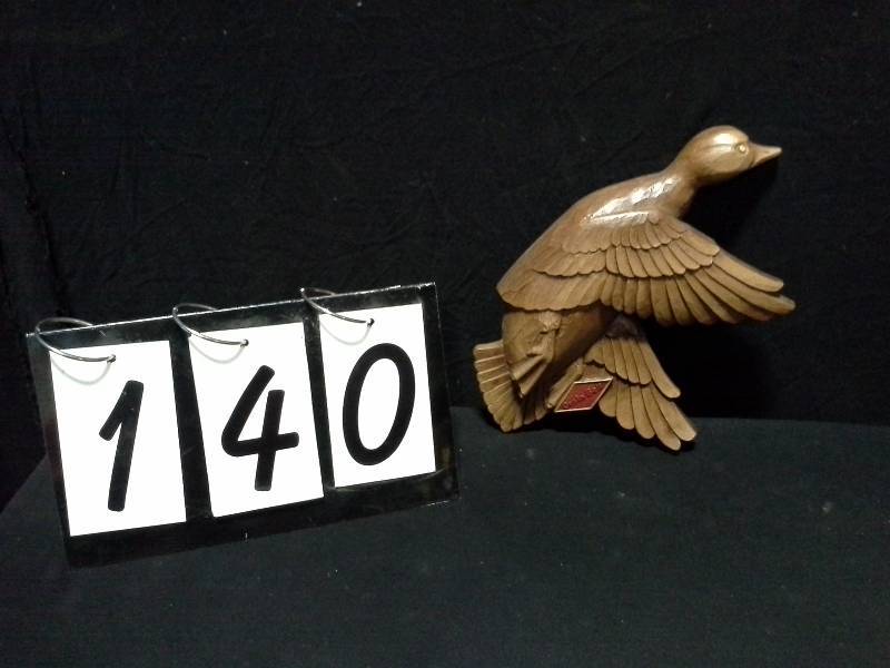 lot 140 image: Grain Belt faux wood carved duck