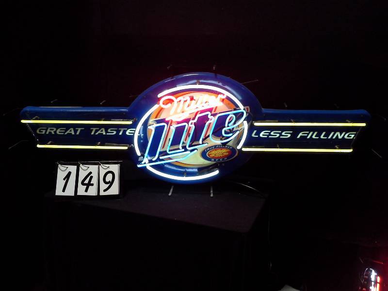 lot 149 image: Miller Lite, Great Taste, Less Filling neon sign