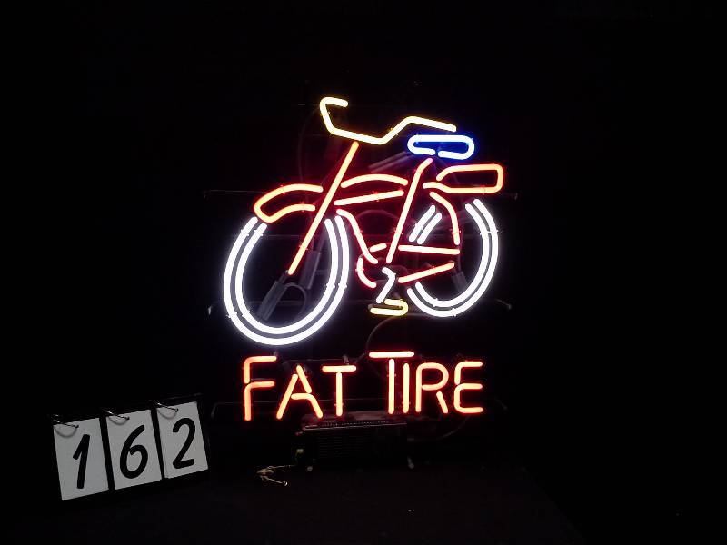 lot 162 image: New Blegium Brewing, Fat Tire neon bike