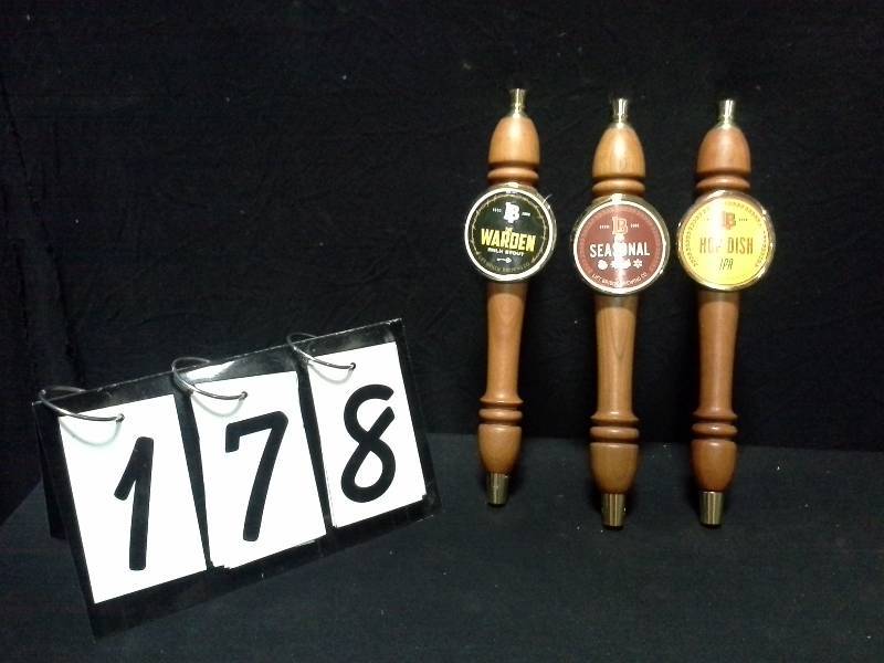 lot 178 image: Lift Bridge Brewing Warden Milk Stout, Seasonal and Hop Dish IPA tap handles