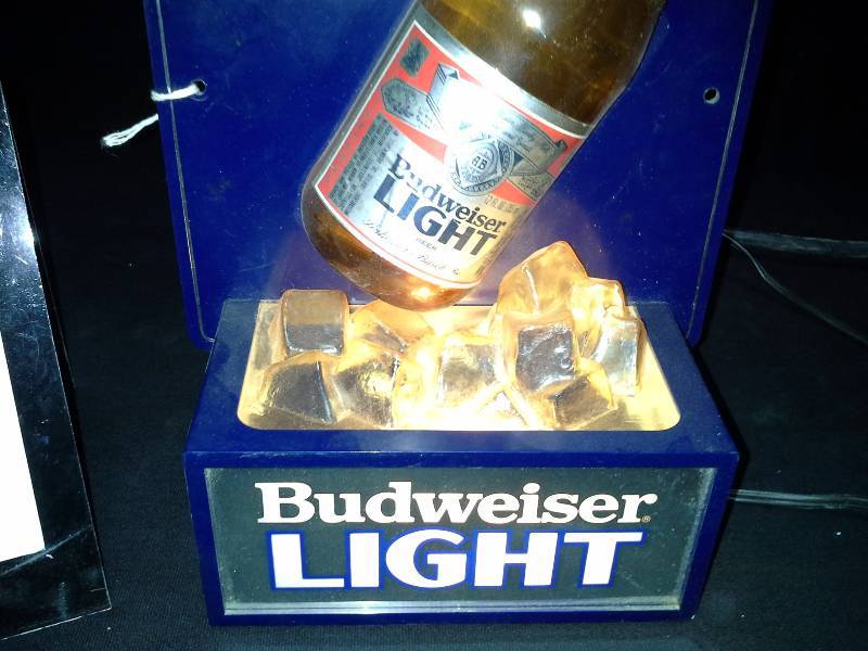 lot 90 image: Bud Budweiser Light plastic light up beer bottle on ice