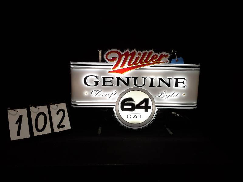 lot 102 image: Miller Genuine Draft Light backlit plastic sign