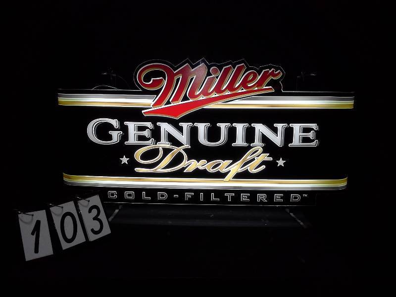 lot 103 image: Miller Genuine Draft Cold-Filtered backlit plastic sign.