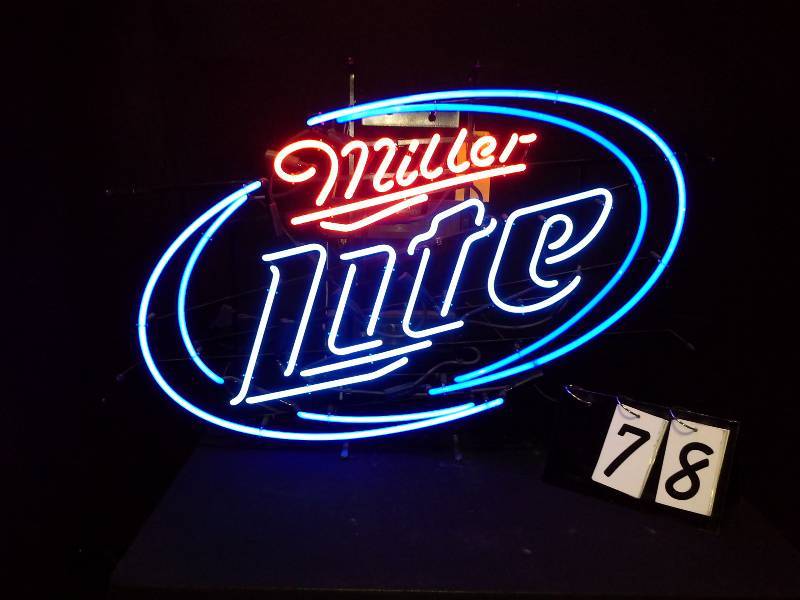 lot 78 image: Miller Lite neon sign with double blue hoops