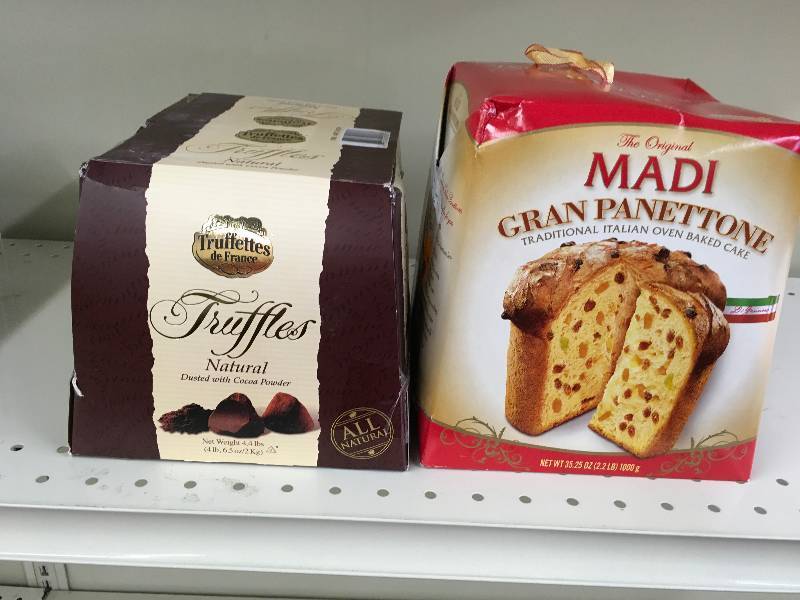 lot 97 image: MADI PANETTONE 2.2 LBS, RETAIL $5.79 AND CHOCMOD TRUFFLES 235.2Z, RETAIL $9.99
