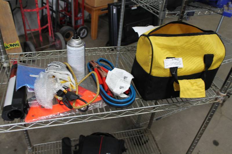 lot 19 image: Road-side Emergency Kit - Flashlight, Jumper Cables, Bungee Cord, Gloves, And More