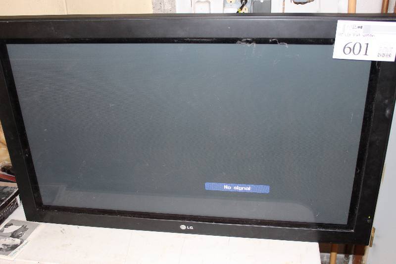 lot 1 image: LG 43in. Flat Screen TV
