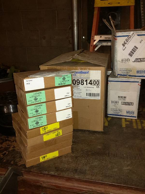 lot 215 image: Flange Kits, U Gaskets, Chemical Spray Apparrel.   Solarguard Sunscreen Wipes