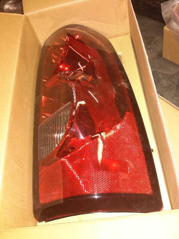 lot 205 image: Right and Left side rear Light replacement for 2004 CV Silverado