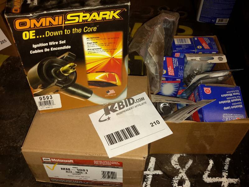lot 210 image: Misc. Auto parts products as pictured..
