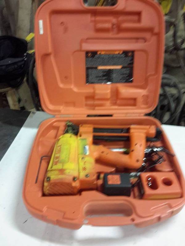 lot 70 image: Paslode Impulse Staple Driver, 1 charger, 2 batteries