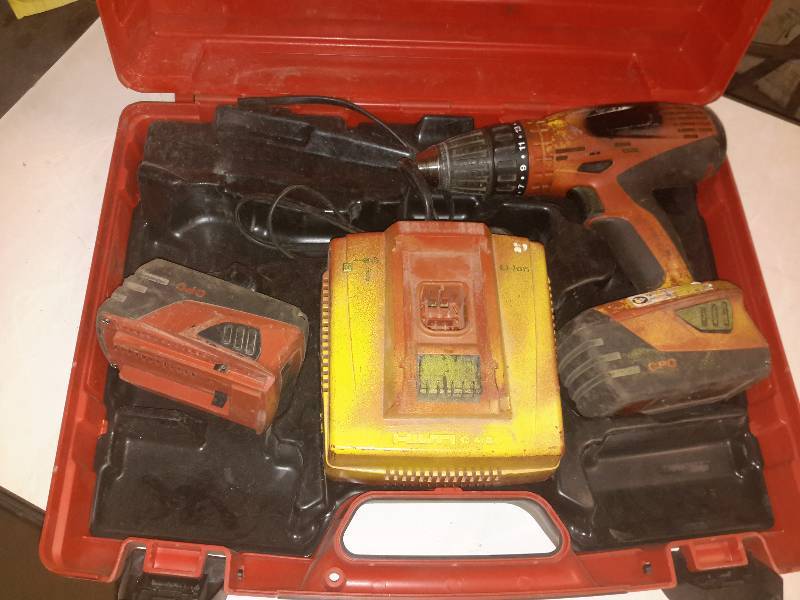 lot 16 image: 1, Hilti SF18A Cordless Drill with 2 batteries and charger.. Charger is missing the plug in end.