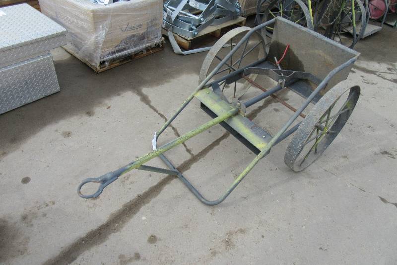 lot 247 image: Double Tank Cart with Metal Spoked wheels.  Lays down to be a pull cart