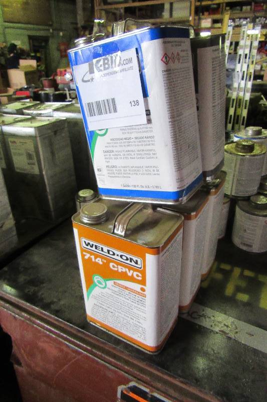 lot 138 image: 5  gallon cans of various types of sealants.. See closeups