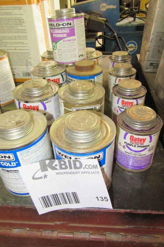lot 135 image: 13 cans of PVC cement