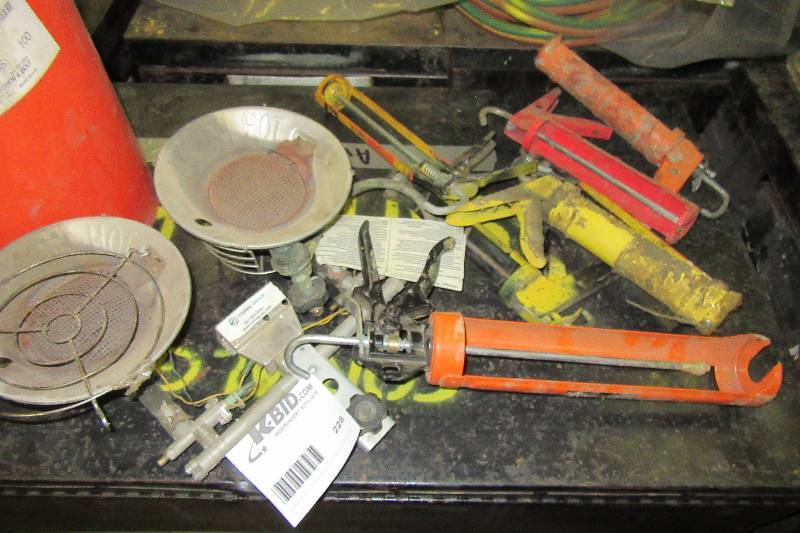 lot 228 image: Lot of caulking guns and a SUNFLOWER, heating unit