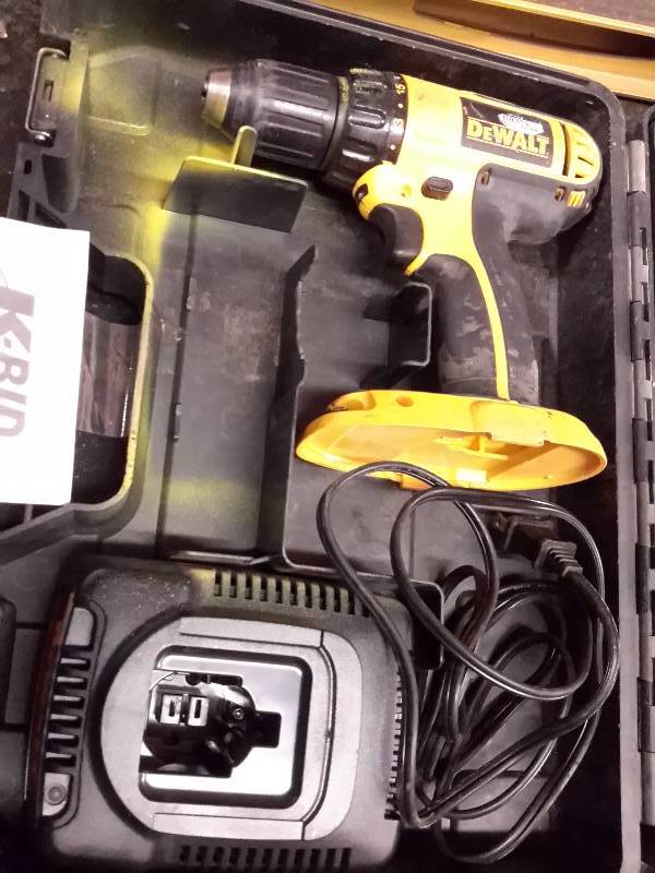 lot 79 image: Dewalt Cordless drill.. No battery.. Charger included